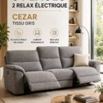 Canapé Cezar en tissu gris, 3 places avec fonction relax électrique dans un salon moderne.