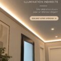 Un salon moderne avec des moulures LED créant une ambiance chaleureuse.